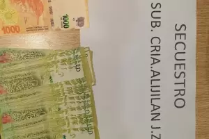 Banda liderada por polic�a en retiro efectivo le rob� a una familia e intent� desalojarlos