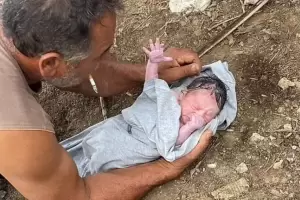 Una beb� reci�n nacida fue arrojada al r�o y dos pescadores la salvaron