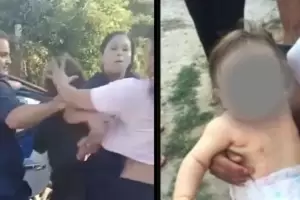 Una mujer fue detenida acusada de golpear a su beba de ocho meses y los vecinos intentaron lincharla