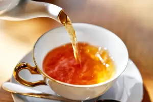 Cules son los beneficios de tomar t y cuntas tazas se pueden tomar en el da?