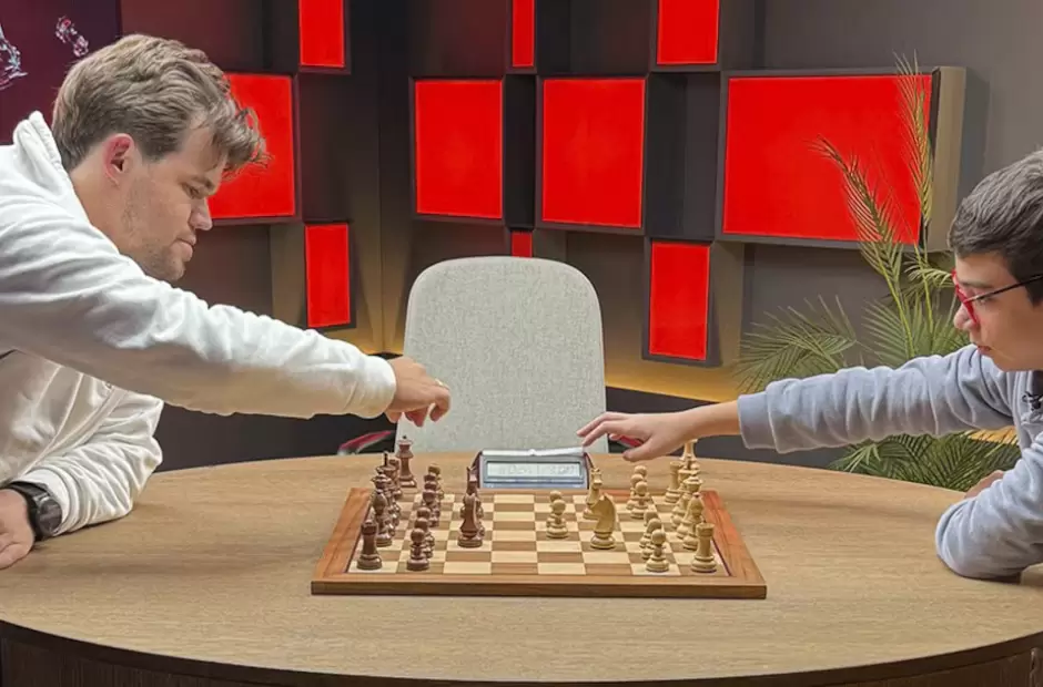 Faustino Oro y Magnus Carlsen
